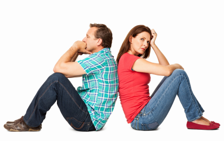 Mature Couple Sitting Back to Back